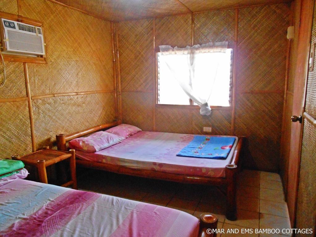 Pareja Tourist Inn Logon Quarto foto